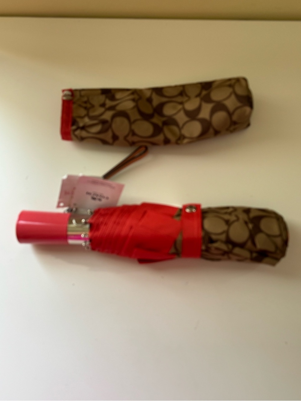 NWT Coach New York Retractable Signature Umbrella in Khaki Watermelon.